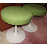 A pair of Eero Saarinen aluminium stools, upholstered in green fabric, height 46cm,