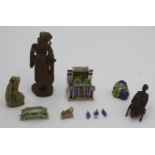 A Chinese porcelain model of a shrine, a soapstone figure and other items.