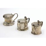 Two silver octagonal section mustard pots, together with one other silver mustard pot, 7.