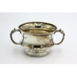 A silver twin handled bowl by Adolph Barsach Davis, Sheffield 1932, 5.7oz.