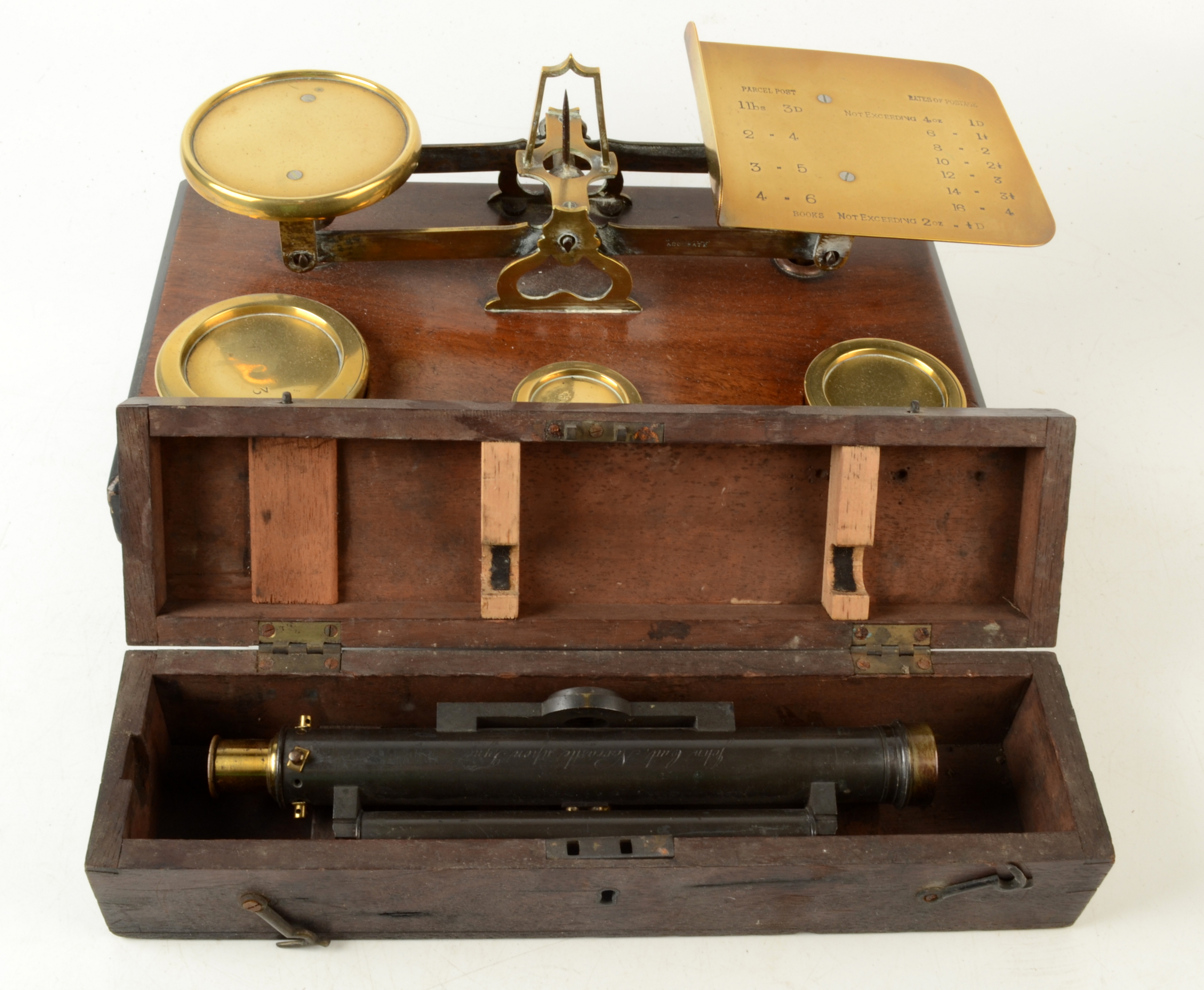 A set of Victorian walnut and brass post office scales, width 35.