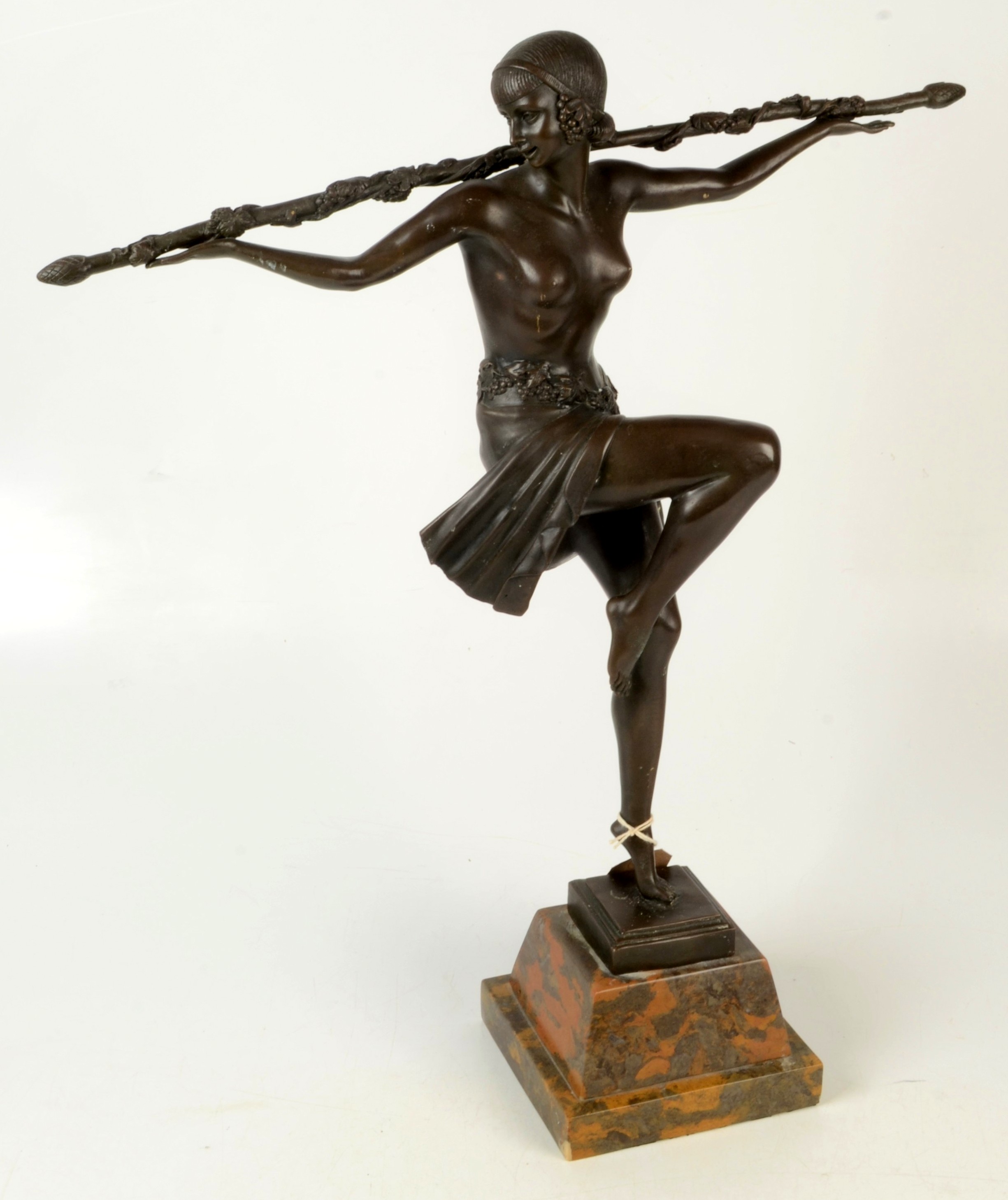 An Art Deco style bronze figure of a scantily clad lady, impressed signature Pierre le Faguays,