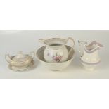 An English Regency porcelain sauce tureen, lid and stand,