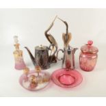 A glass liqueur set, damage, a cranberry glass biscuit barrel, lid and stand,