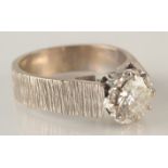 An 18ct. yellow gold ring solitaire set a diamond of approximately 0.75ct.