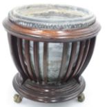 A 19th century jardiniere, with earthenware liner,