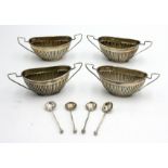 A set of four fluted silver condiments and condiment spoons, Birmingham 1898, 3.6oz.