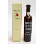A bottle of Madeira Barbeito Verdelho 1981.