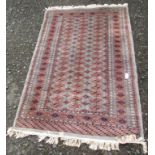 A Pakistan rug, the blue field with nineteen rows of three octagonal medallions,