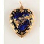 An engraved Victorian gold heart shaped locket, one side holds a miniature portrait,