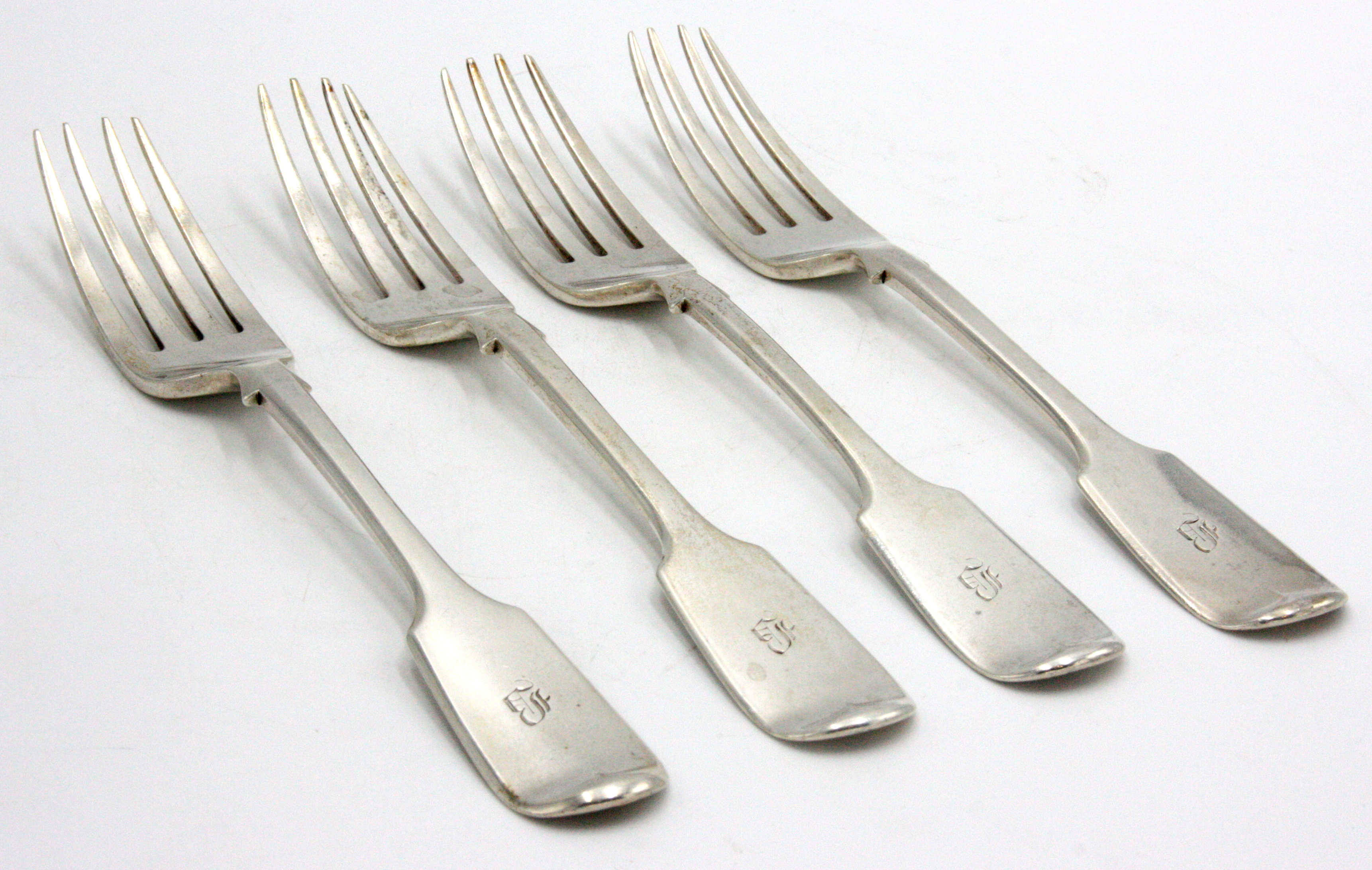 A set four silver fiddle pattern forks, Exeter 1840, 11oz.
