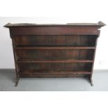 A George III oak dresser rack, with three shelves, height 115cm, width 161cm.