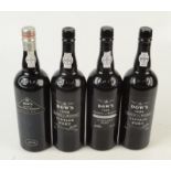 Four bottles of Dow's Vintage Port, two 1998 and two 1999.