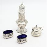 Two pierced silver salts, a silver mustard pot, each with blue glass liner,