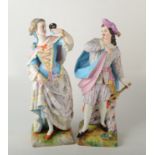 A pair of French biscuit porcelain figures in court dress, he holds a mandolin, she a mask,