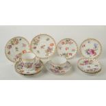 Ten various German outside decorated saucers painted in Deutsch Blumen style with gilt borders