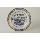A Swansea porcelain plate, blue printed with the 'Elephant Rock' pattern beneath gilding,