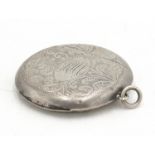 A Rotherham & Sons circular silver vesta case with ornate acanthus engraving, Birmingham 1904.