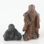 A Chinese carved wood okimono and a netsuke, heights 8 and 3.5cm.