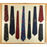 A collection of international rugby ties, framed and glazed, 79 x 92cm.