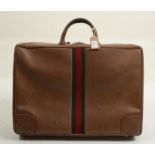 A Gucci brown leather holdall, 1970s.