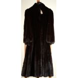 A Ranch mink ladies full length fur coat, very dark black brown, big sweep, size 12, length 122cm.