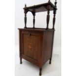 An Edwardian inlaid rosewood coal purdonium, height 110cm, width 48cm, depth 39cm.