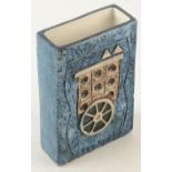A Troika pocket vase, with unusual designs on one face a stylized cart,