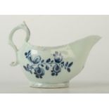A Liverpool blue and white porcelain cream boat, 18th century, height 8cm, length 12cm.