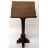 An Arts and Crafts oak lectern, height 124.5cm, width 40cm.