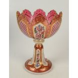 A good Bohemian 19th century cranberry glass stemmed bowl with shaped rim and enamelled and cut