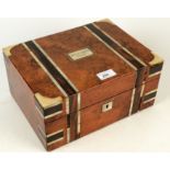 A Victorian burr walnut sewing box, with a fitted tray, coromandel and mother of pearl inlay,