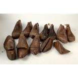 A collection of wooden shoe lasts.