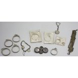 Silver coin mounts and coin jewellery.