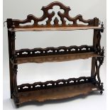 A set of Victorian walnut hanging shelves, with three shaped tiers, height 67cm, width 67cm,