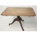 A George III mahogany snap top breakfast table,