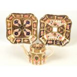 Two Royal Crown Derby Japan pattern square dishes and a similar miniature coffee pot.