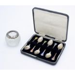 A set of six enamelled silver Art Deco coffee spoons, cased,