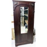 An Arts & Crafts oak wardrobe,