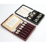 A set of six silver replica cochlearium spoons, cased,