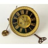 A Victorian eight day mantel clock movement, pendulum and winder.