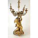 A French ormolu candelabrum, 19th century, with four leaf cast branches around a central stem,