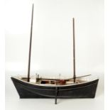 A scale model of the 1897 Mount's Bay mackerel driver 'Boy Willie' PZ602,