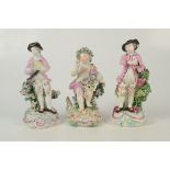 Three 18th century English porcelain figures, one, a figure holding grapes, representing autumn,