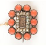 A coral and pearl gold mourning brooch.