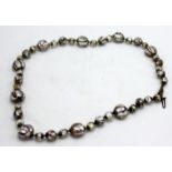 A Venetian glass bead necklace.