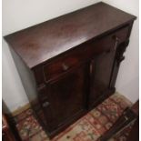 A mahogany side cabinet, early 19th century, with a single frieze drawer,