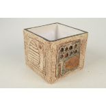 A Troika cube vase, the body decorated with geometric designs, painted initials PB for Penny Black,