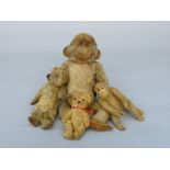 A Merrythought plush monkey, probably 1950s, with stitched label, length 37cm,