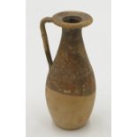 An early Roman type pottery oil jar, of tapered form with simple handle, height 14cm.